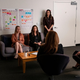 Sally (Sarah Goldberg), far left, in a network-TV meeting in Barry